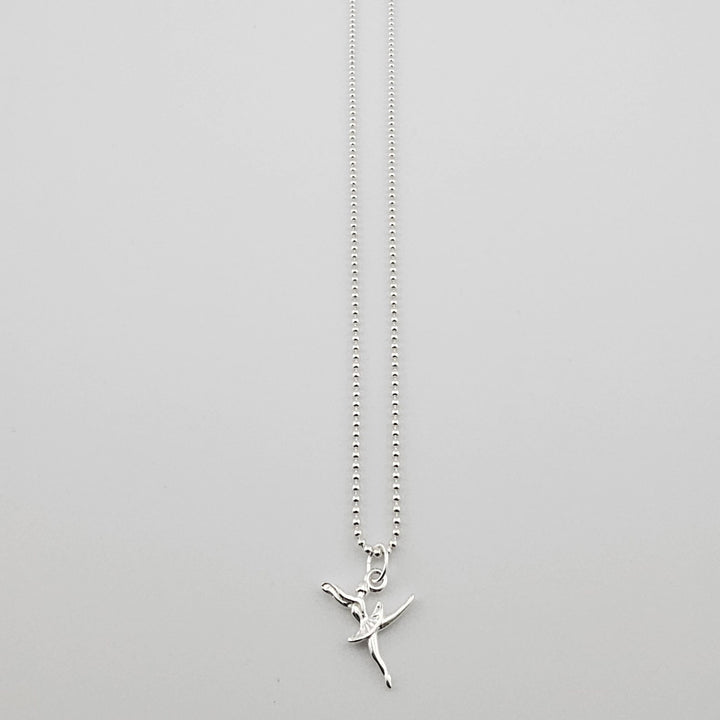 Sterling silver ballerina pendant necklace on fine chain.