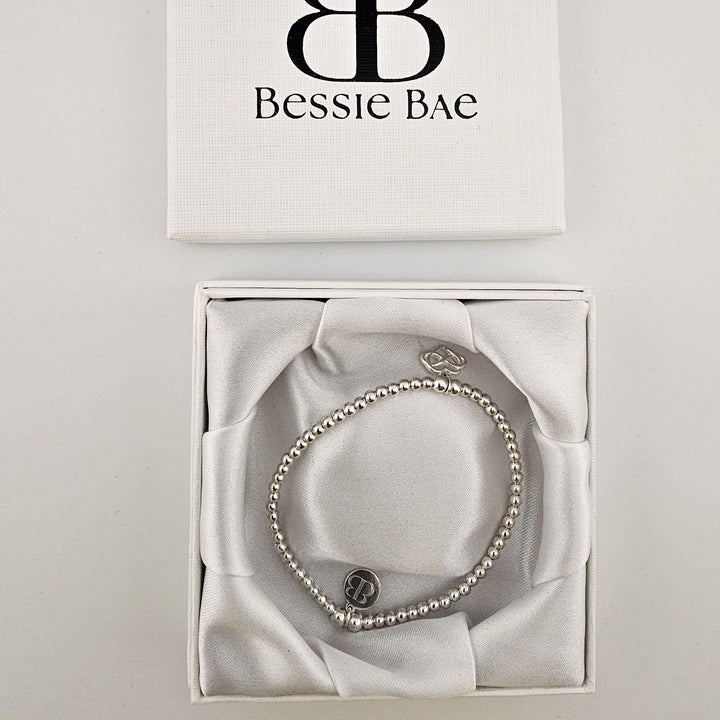 Minimalist sterling silver stretch bracelet for everyday wear.