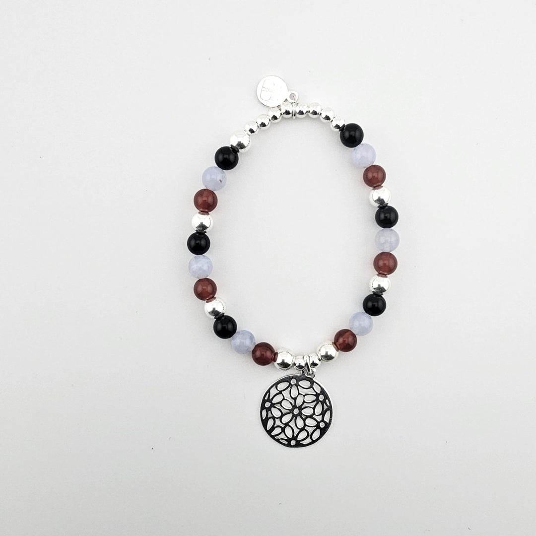 Sterling silver flower bracelet with blue lace agate, garnet and onyx.
