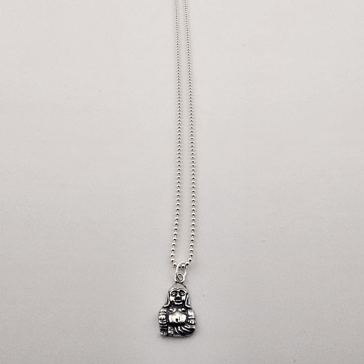 Sterling silver Buddha pendant necklace on fine chain.