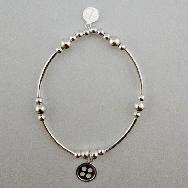 Sterling Silver Button Bracelet handcrafted by Bessie Bae.
