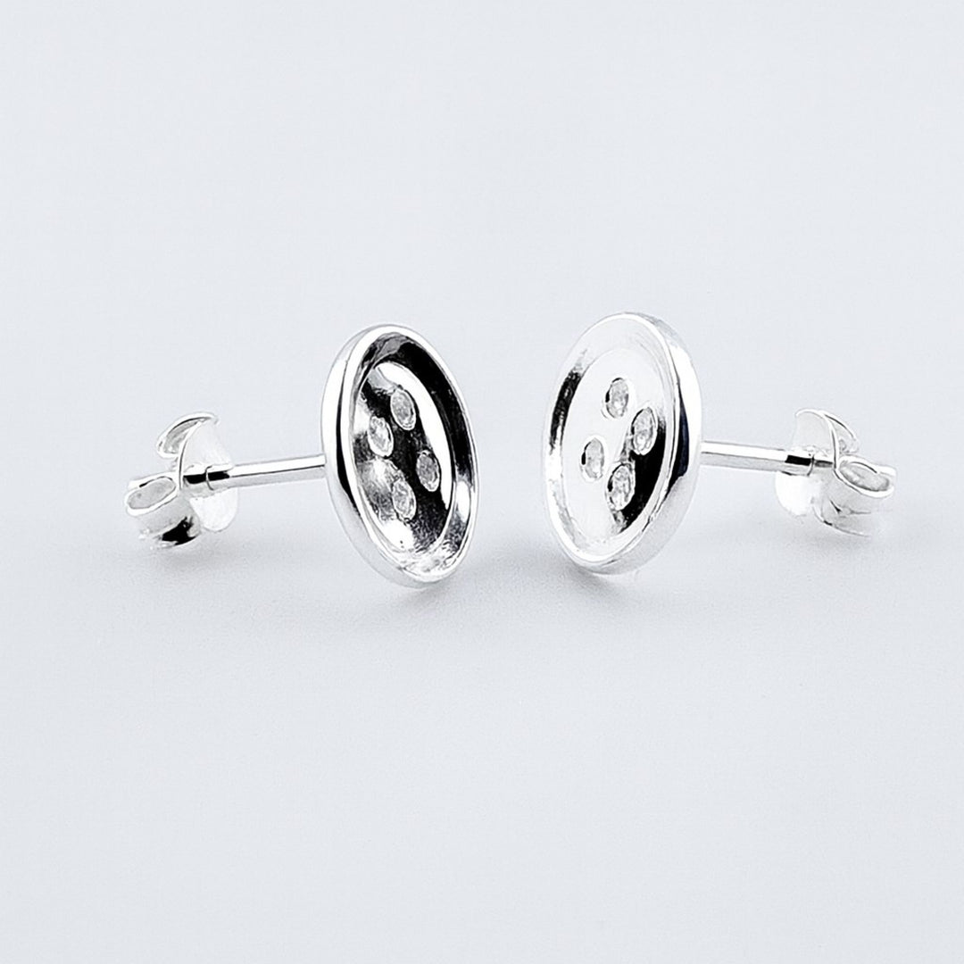 Sterling silver button stud earrings with butterfly backs.