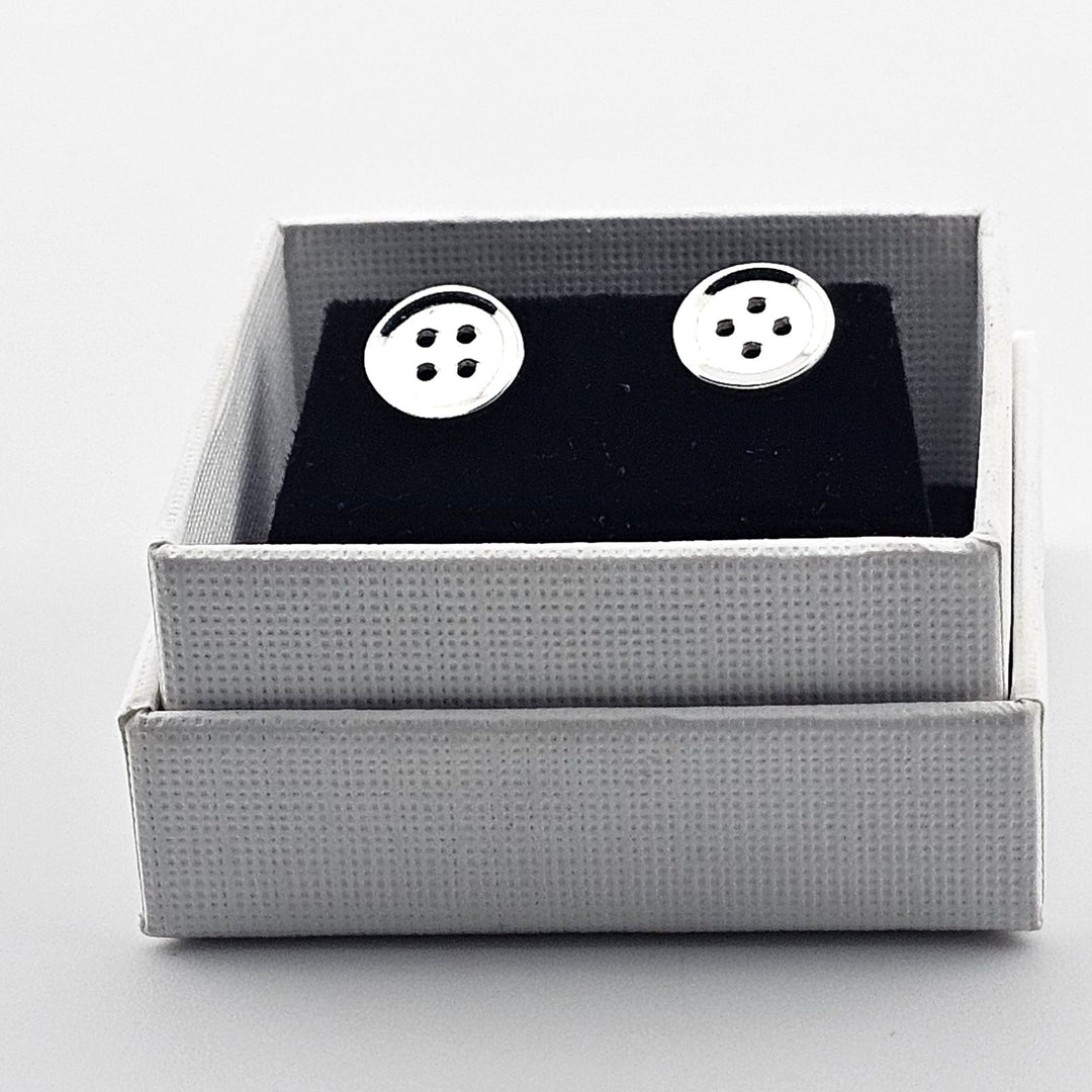 Minimalist sterling silver button earrings for women.