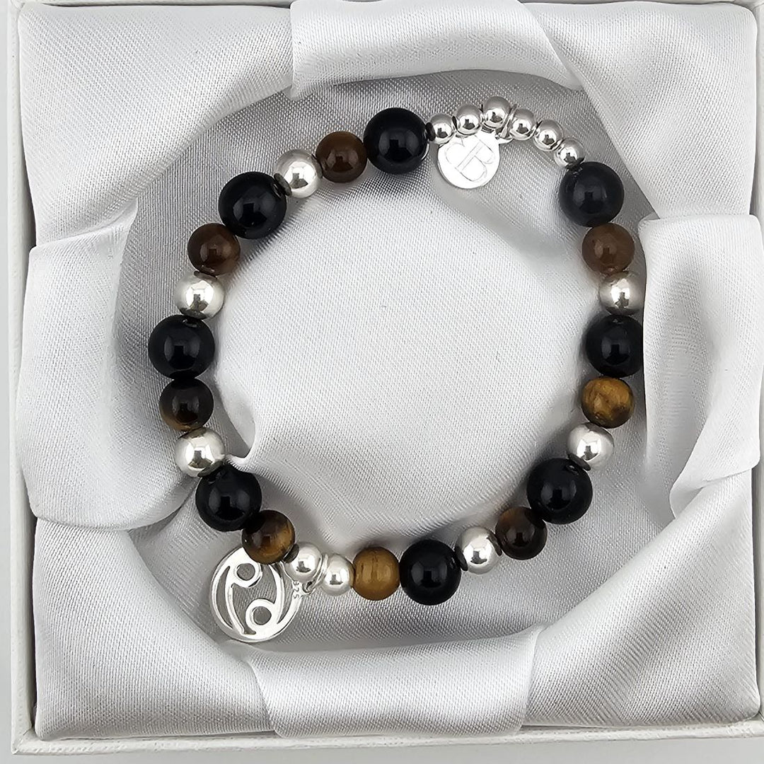 Handmade Cancer star sign bracelet with black onyx and tiger’s eye.