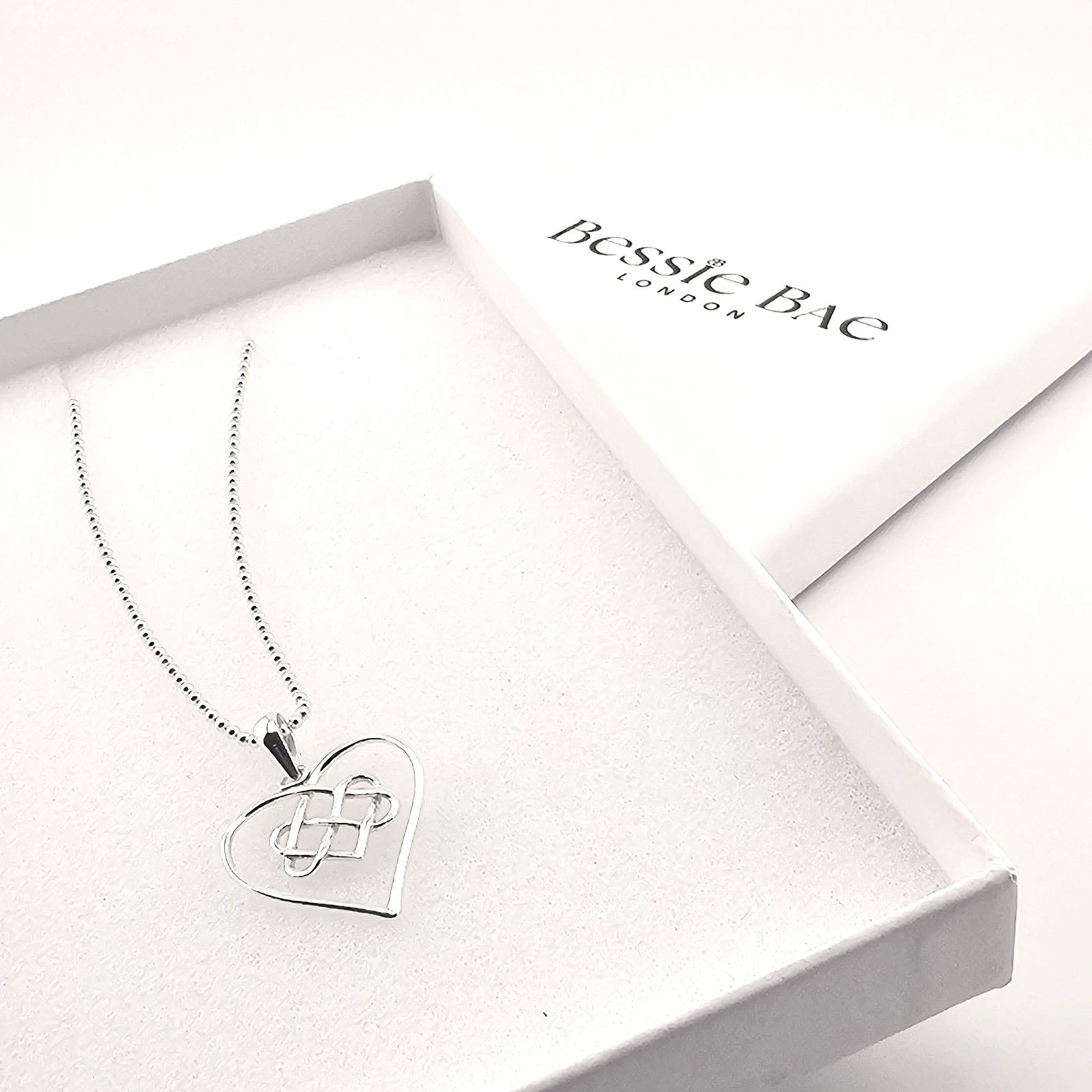 Symbolic sterling silver Celtic heart necklace for love and unity.