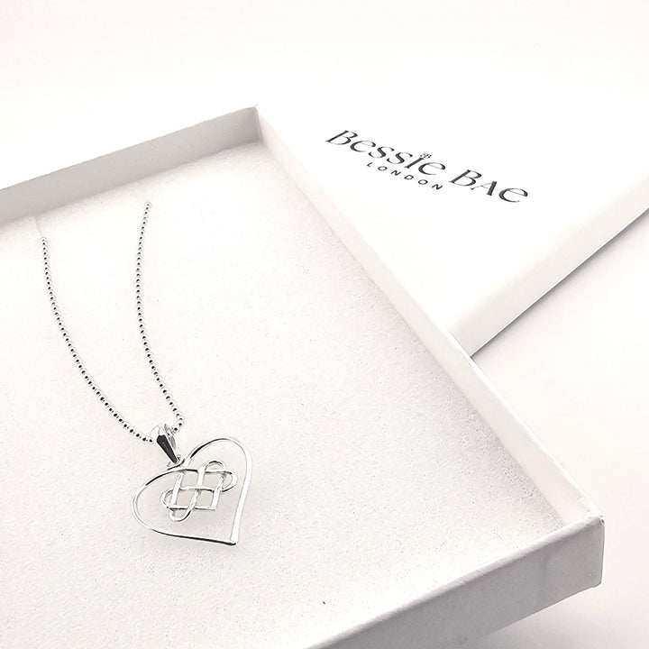 Symbolic sterling silver Celtic heart necklace for love and unity.