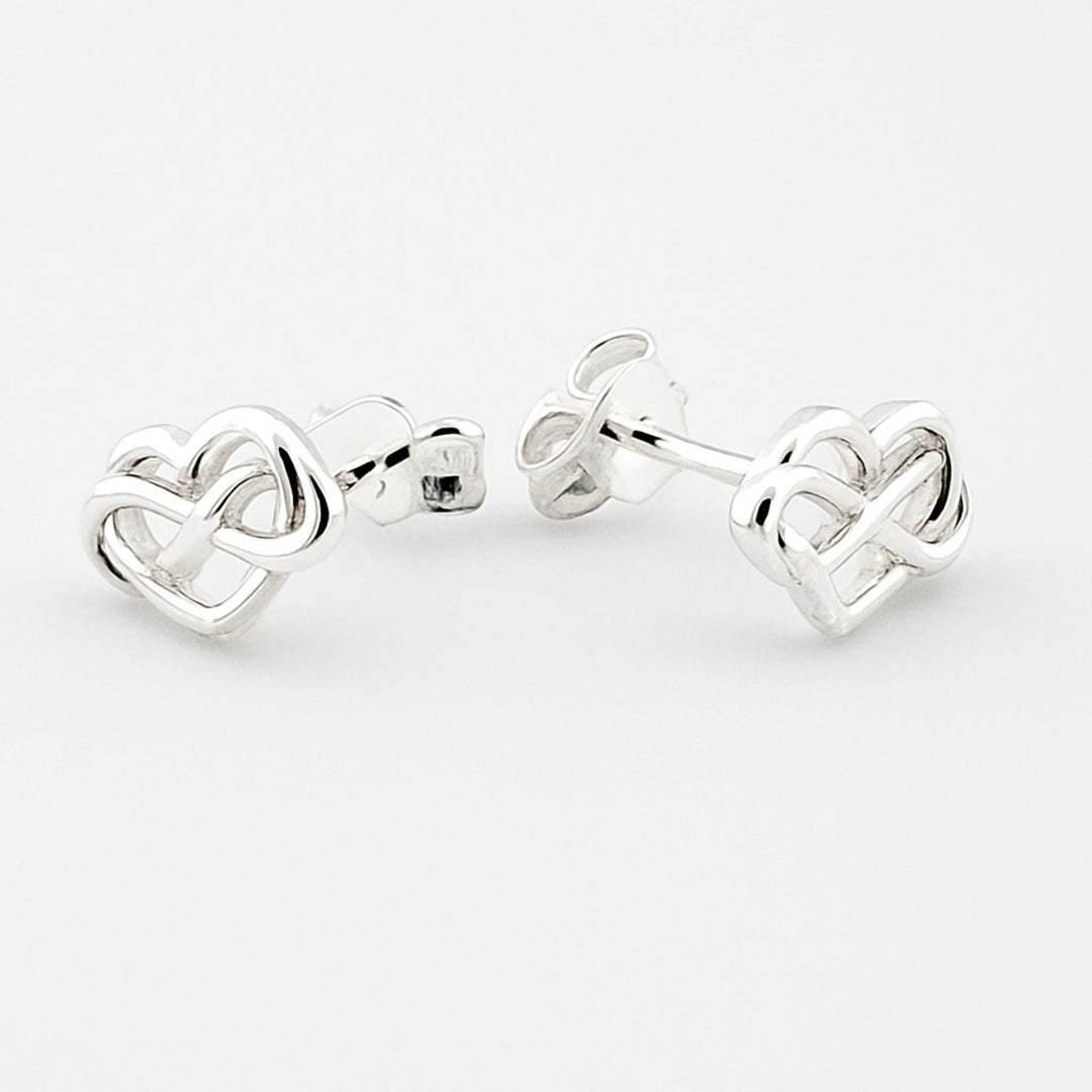 Sterling silver Celtic heart stud earrings with butterfly backs.