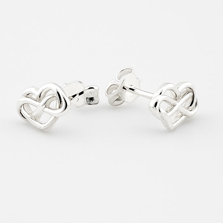 Sterling silver Celtic heart stud earrings with butterfly backs.