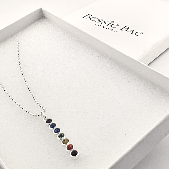 Silver chakra necklace with colourful gemstones for yoga and meditation.