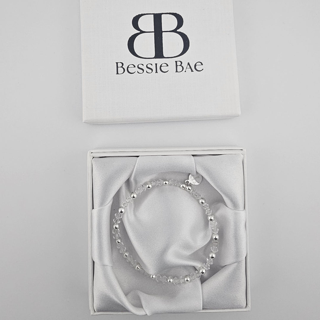 Handmade sterling silver bracelet with sparkling clear crystals.