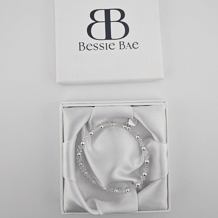 Handmade sterling silver bracelet with sparkling clear crystals.