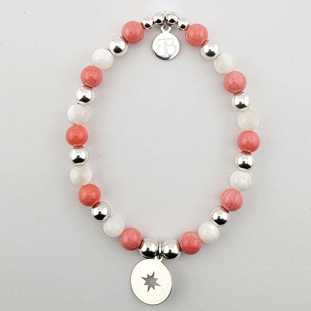 Sterling silver compass bracelet with mother of pearl and coral beads.