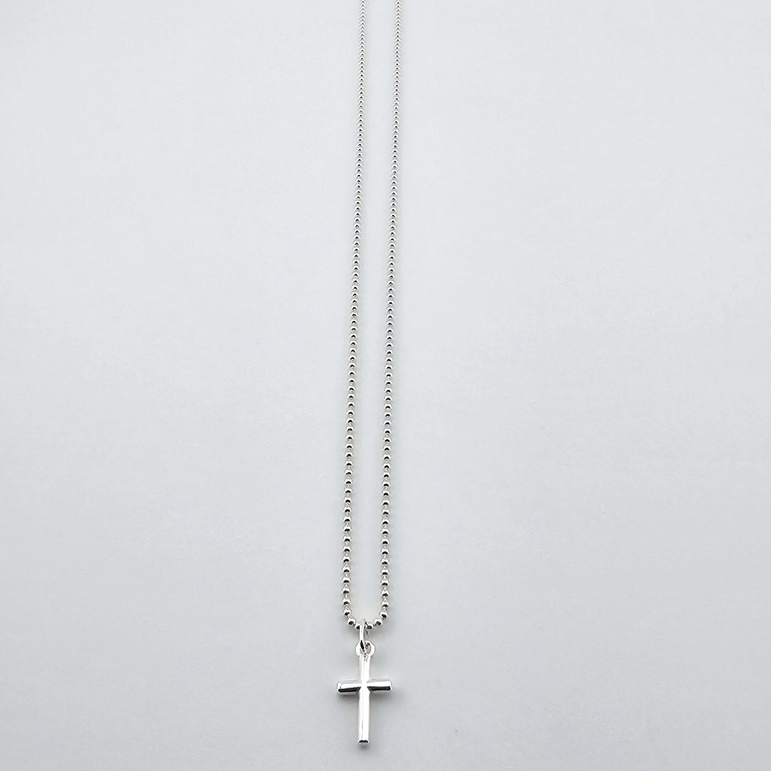Classic silver cross pendant necklace for men and women.
