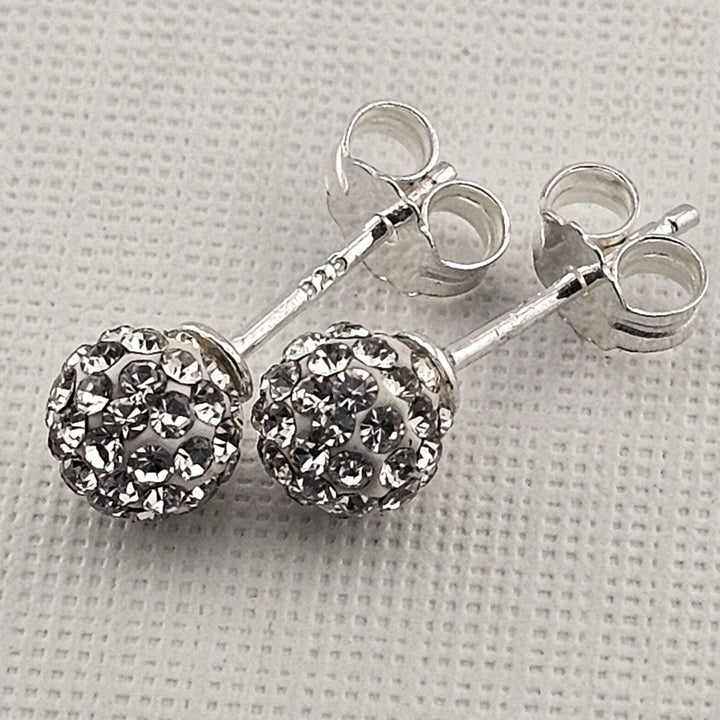 Glittering crystal ball earrings minimalist silver studs.