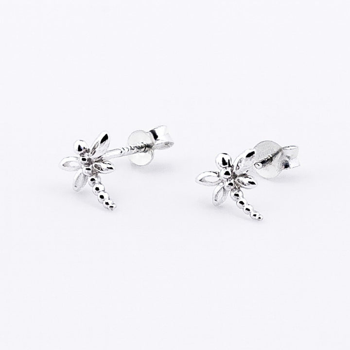 Sterling silver dragonfly stud earrings with butterfly backs.