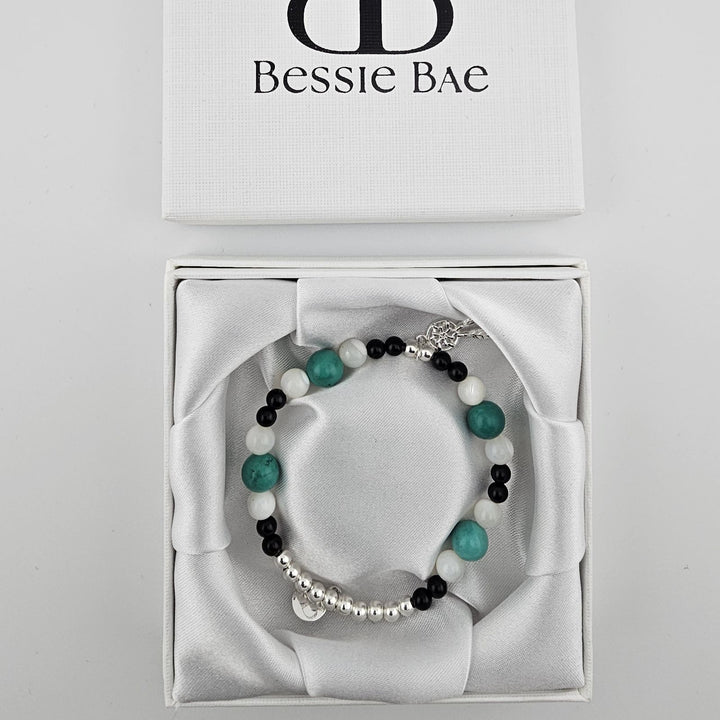 Bohemian gemstone bracelet with dreamcatcher pendant charm.