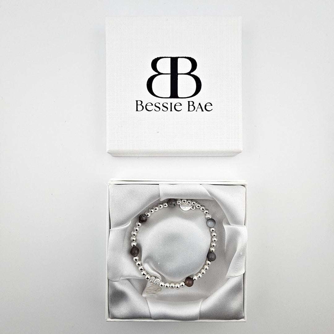 Eye of Horus bracelet displayed in Bessie Bae gift box on white background.