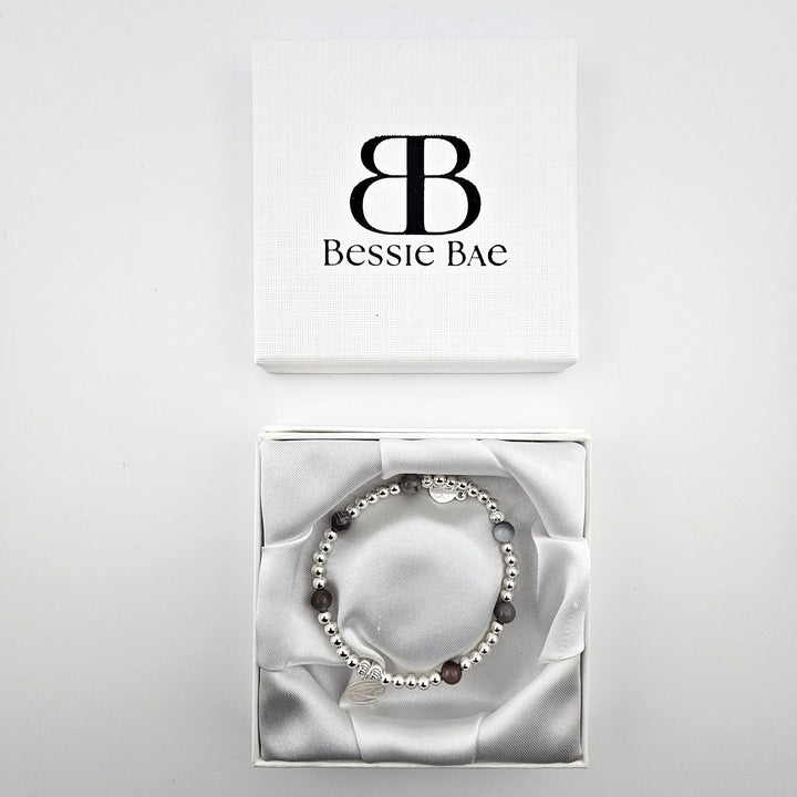Eye of Horus bracelet displayed in Bessie Bae gift box on white background.