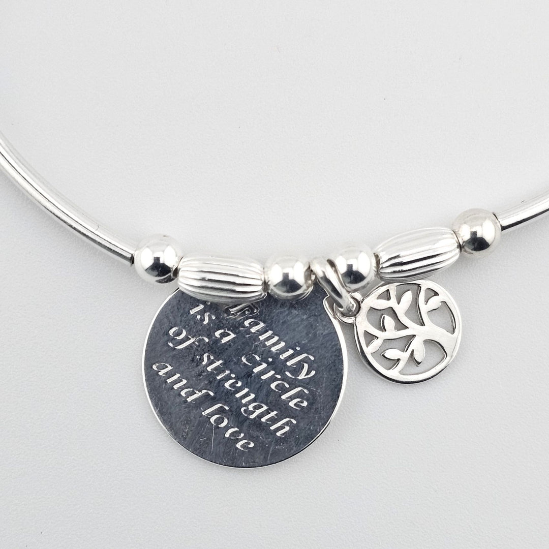 Handmade 925 sterling silver bracelet with family quote charm.