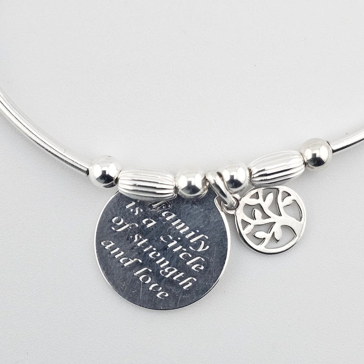 Handmade 925 sterling silver bracelet with family quote charm.
