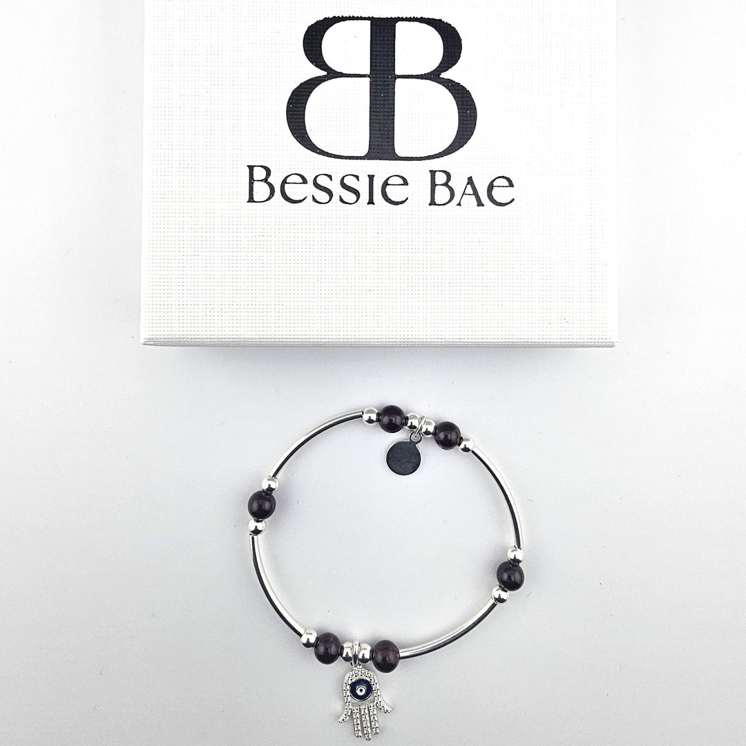 Elegant Hamsa charm bracelet symbolising luck and protection.