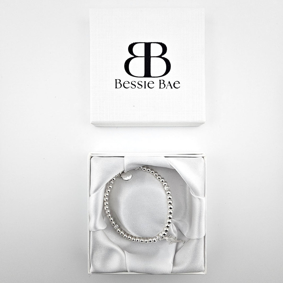 Handmade gecko bracelet displayed in Bessie Bae gift box.