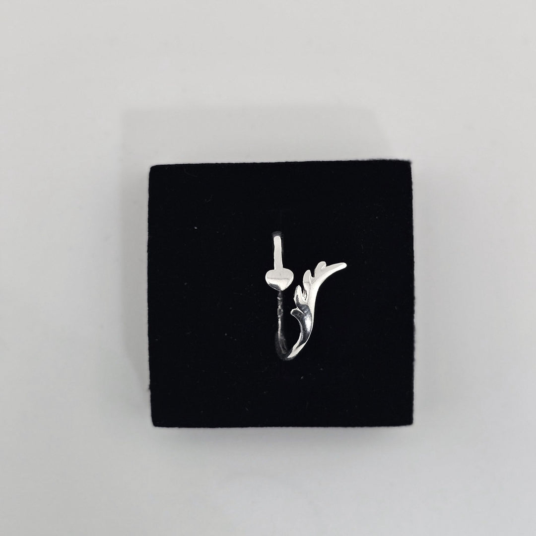 Adjustable sterling silver arrow and heart ring – symbolic everyday jewellery.
