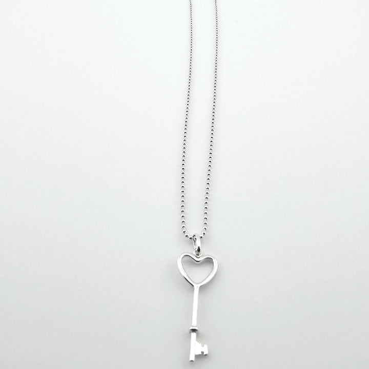 Sterling silver heart key pendant necklace symbolising love and romance.