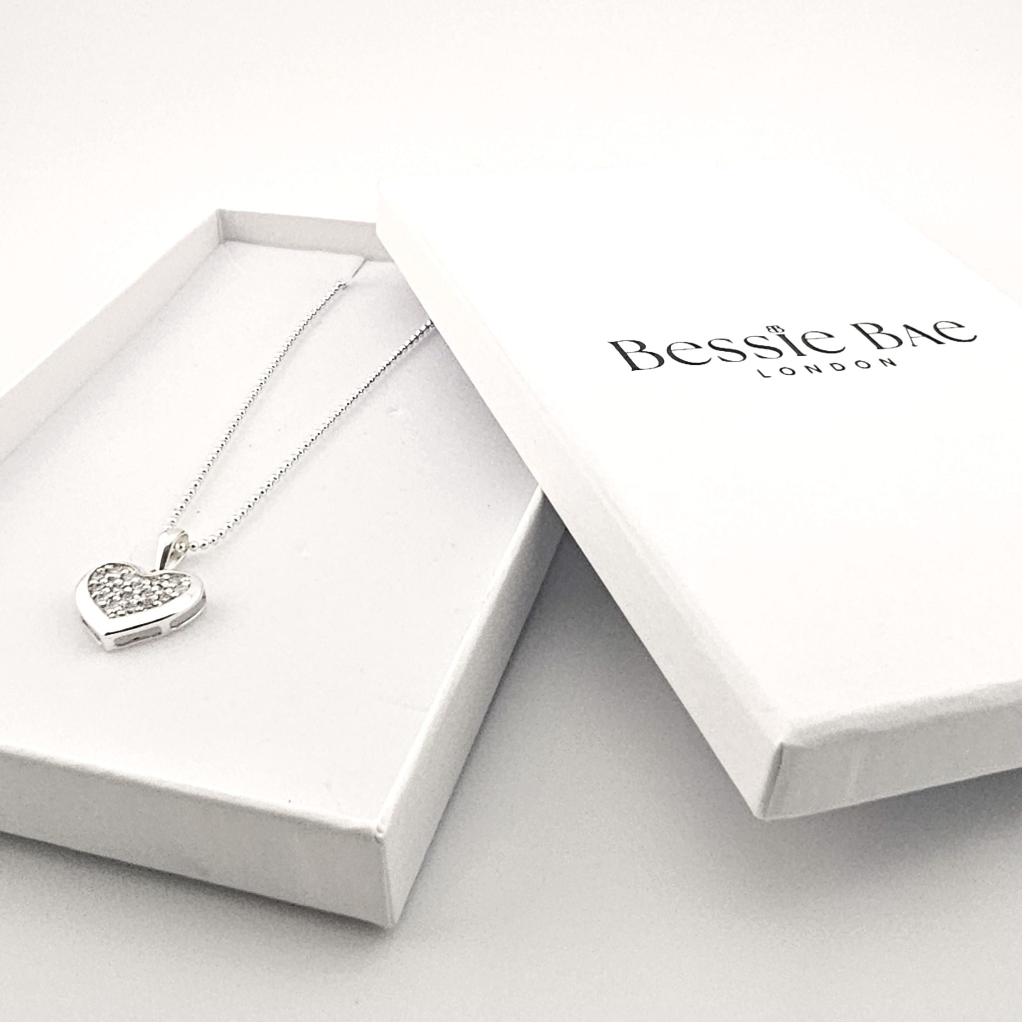 Elegant sterling silver heart necklace with pavé detail, timeless jewellery piece.