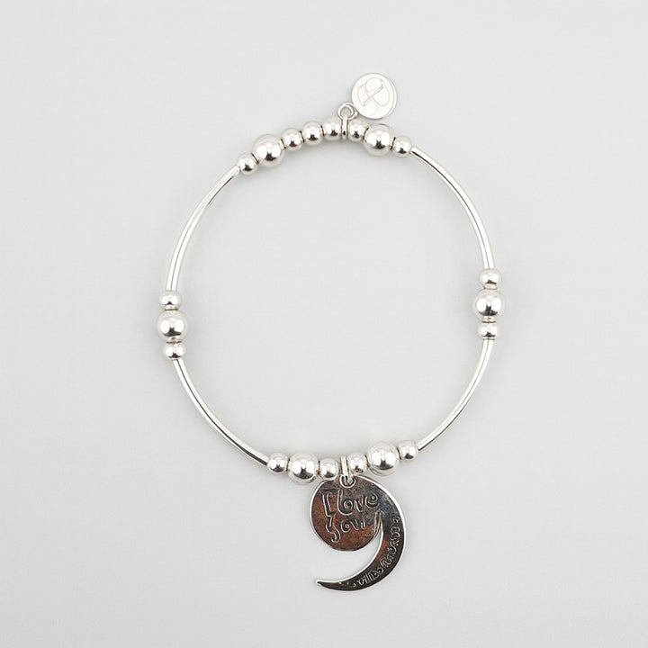 Sterling silver bracelet with I Love You to the Moon charm.
