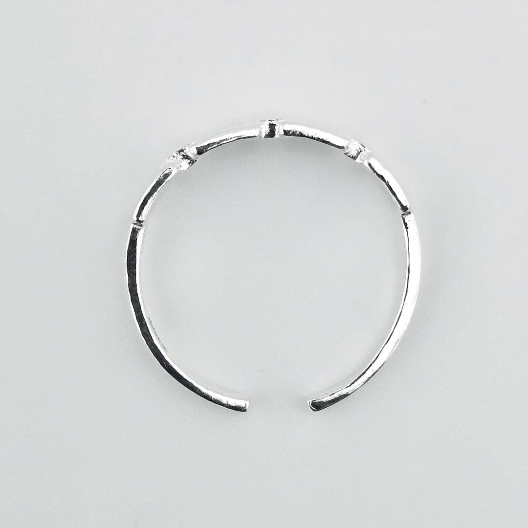 Adjustable silver chain ring for women.