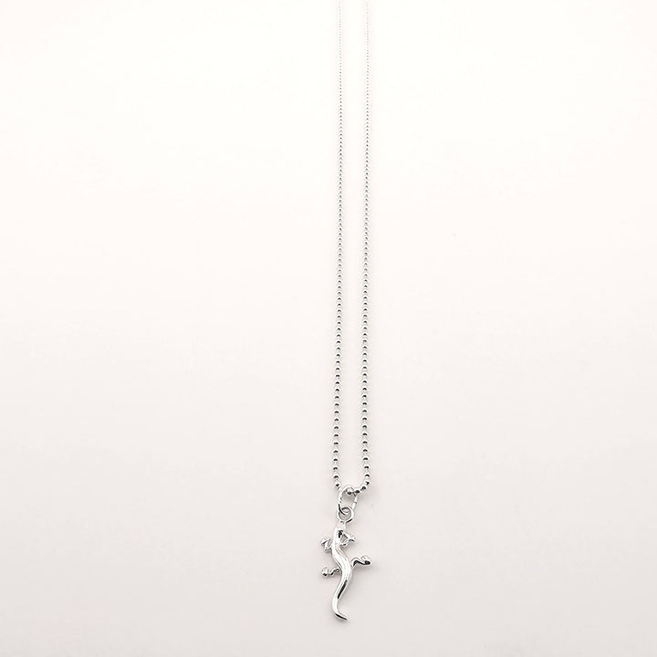 Unisex sterling silver lizard necklace, symbolic animal pendant gift.