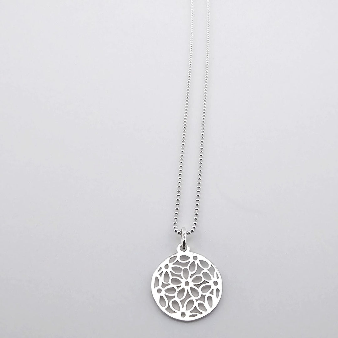 925 silver necklace featuring circular mandala-inspired pendant.