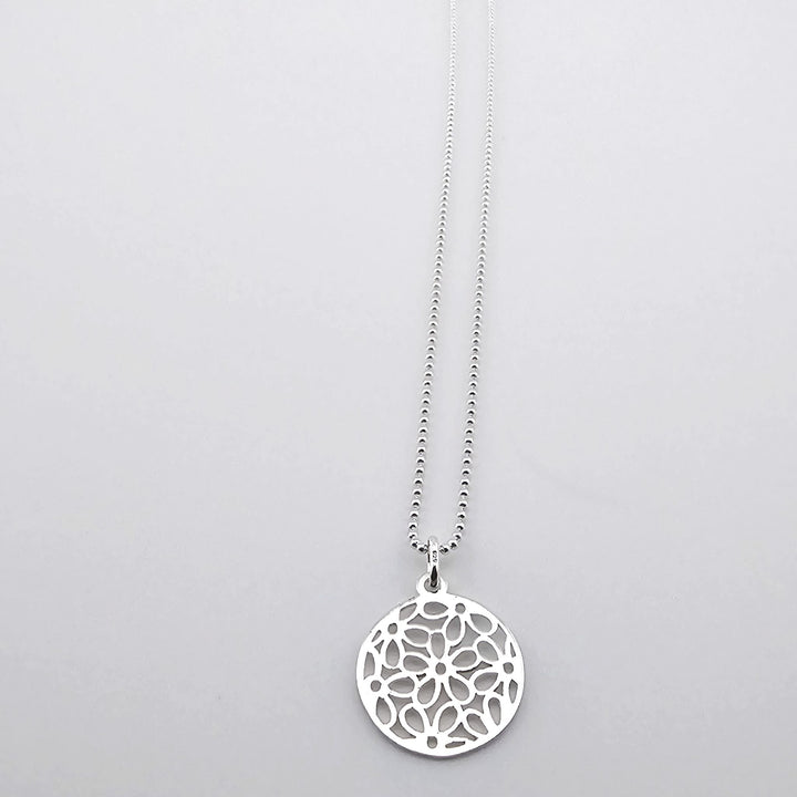925 silver necklace featuring circular mandala-inspired pendant.