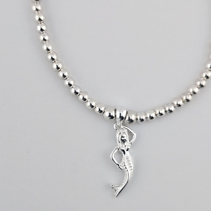 Handmade sterling silver mermaid charm bracelet UK.