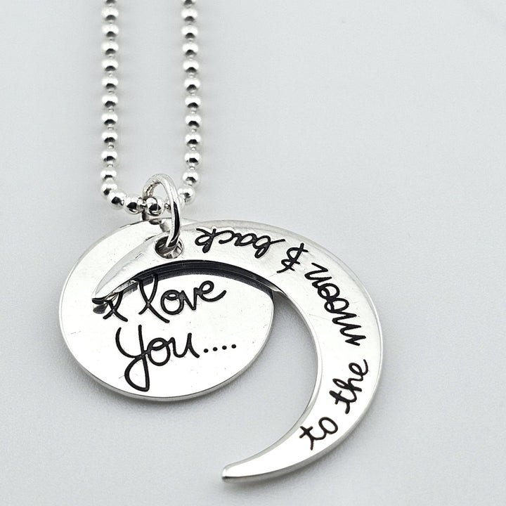 925 silver romantic pendant necklace with love inscription on moon and disc.