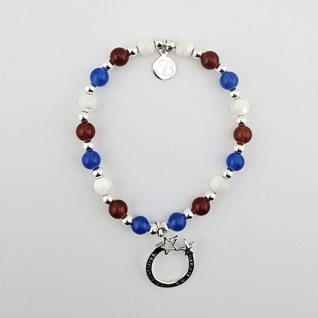Sterling silver moon and stars bracelet with carnelian, mother of pearl and blue onyx beads.