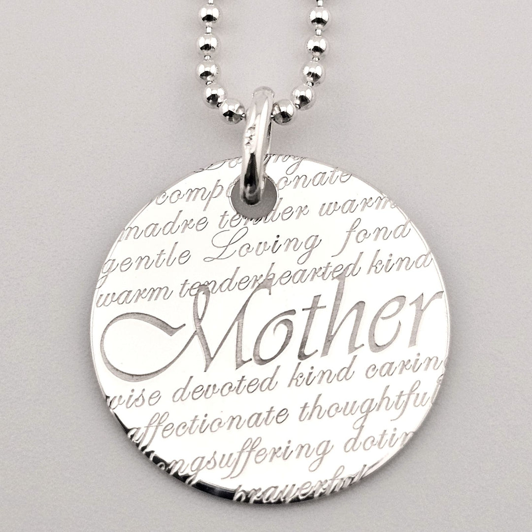 Close-up of sterling silver necklace with Mother inscription, gift jewellery.
