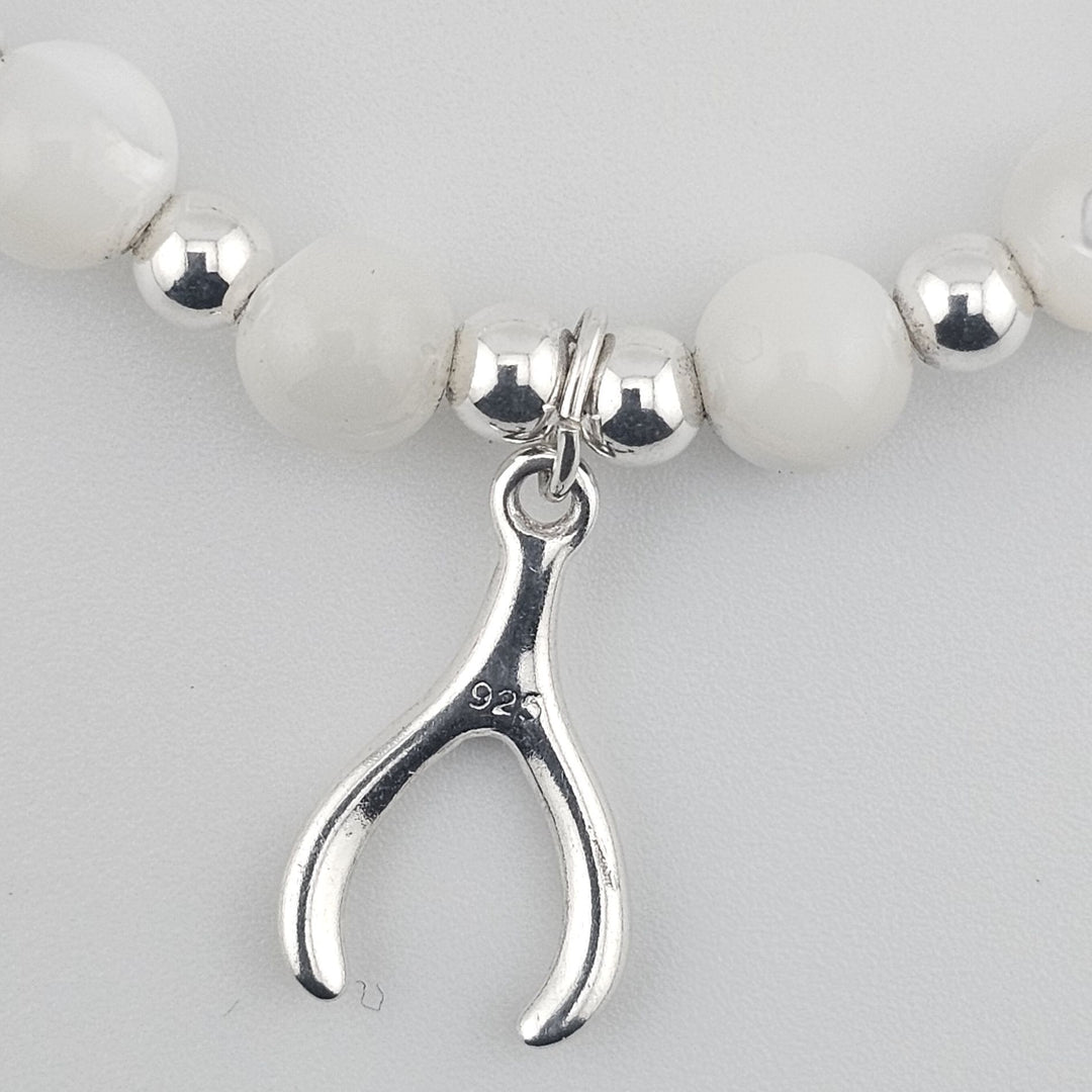 Sterling silver and mother of pearl wishbone bracelet.