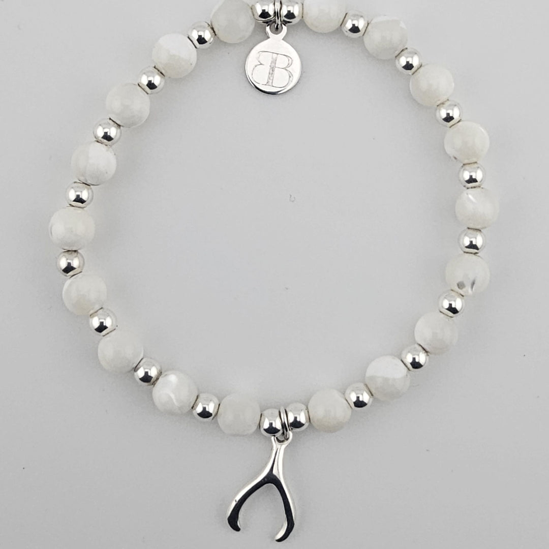 Sterling silver and mother of pearl wishbone bracelet.