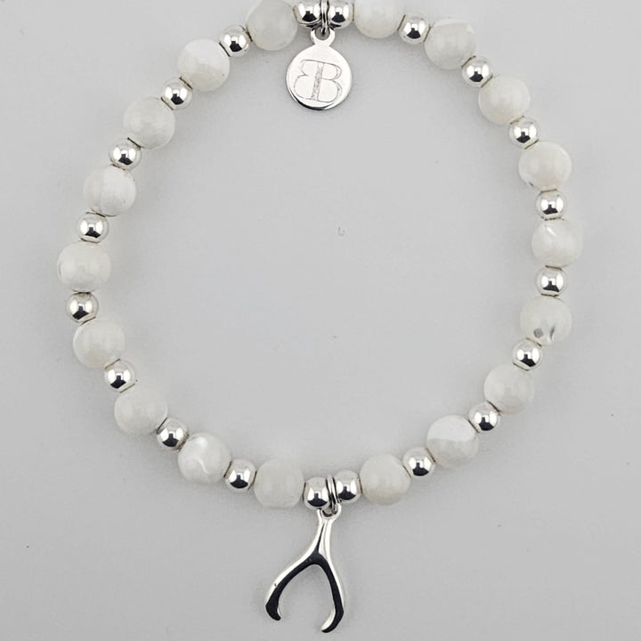 Sterling silver and mother of pearl wishbone bracelet.