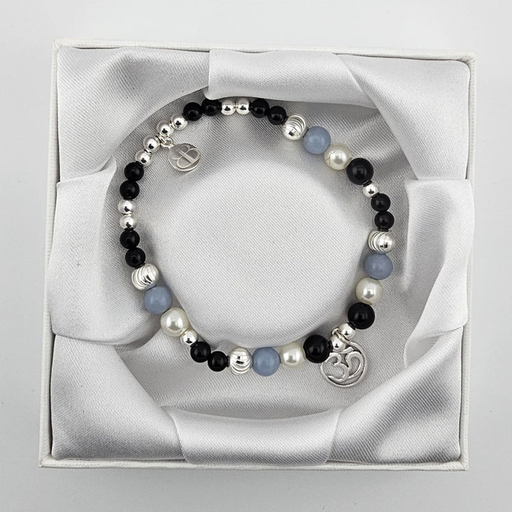 925 sterling silver beaded bracelet with Om symbol charm.