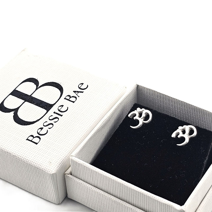 Sterling silver Om stud earrings minimalist yoga jewellery.