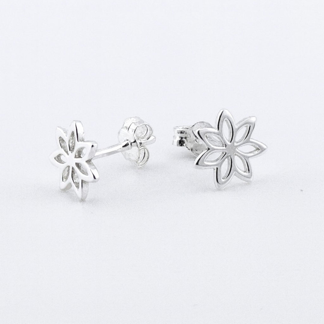 Sterling silver open flower stud earrings with butterfly backs.