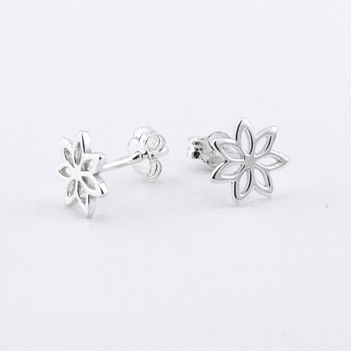 Sterling silver open flower stud earrings with butterfly backs.