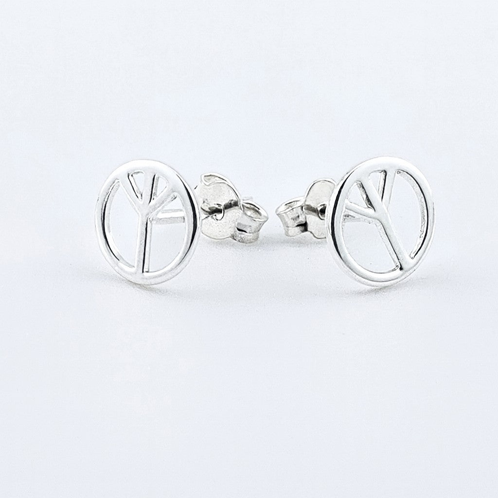 Sterling silver peace symbol stud earrings with butterfly backs.
