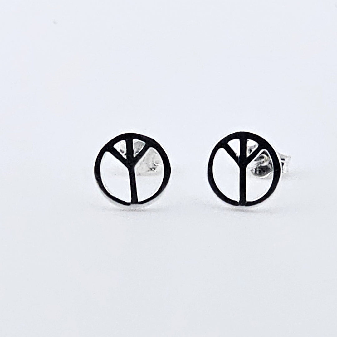 Minimalist sterling silver peace studs with scroll fittings.