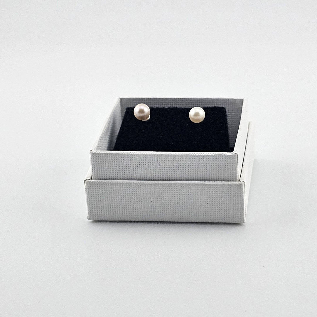 Elegant freshwater pearl stud earrings in sterling silver.