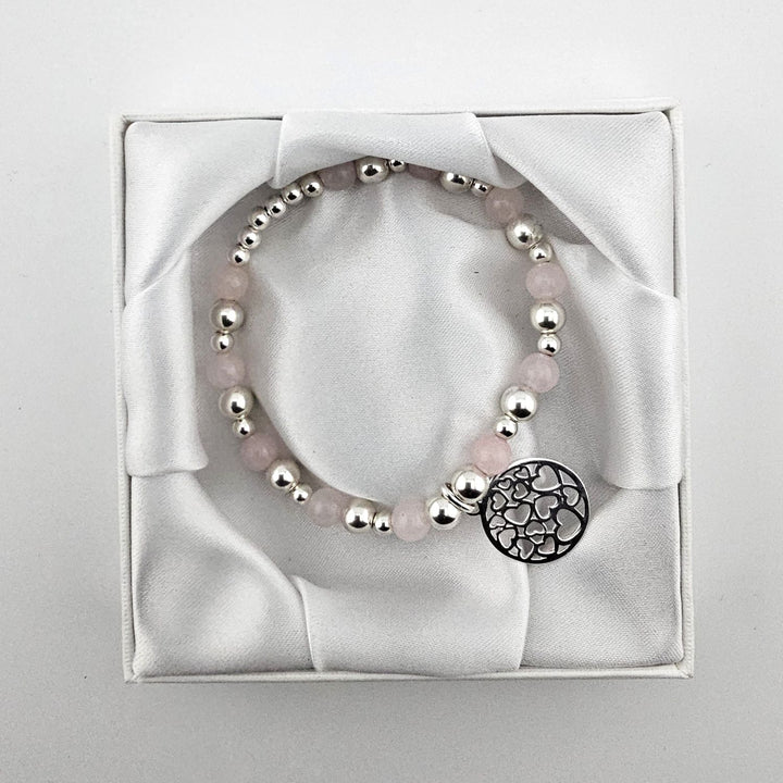 Sterling Silver and Rose Quartz gemstone bracelet displayed in box.