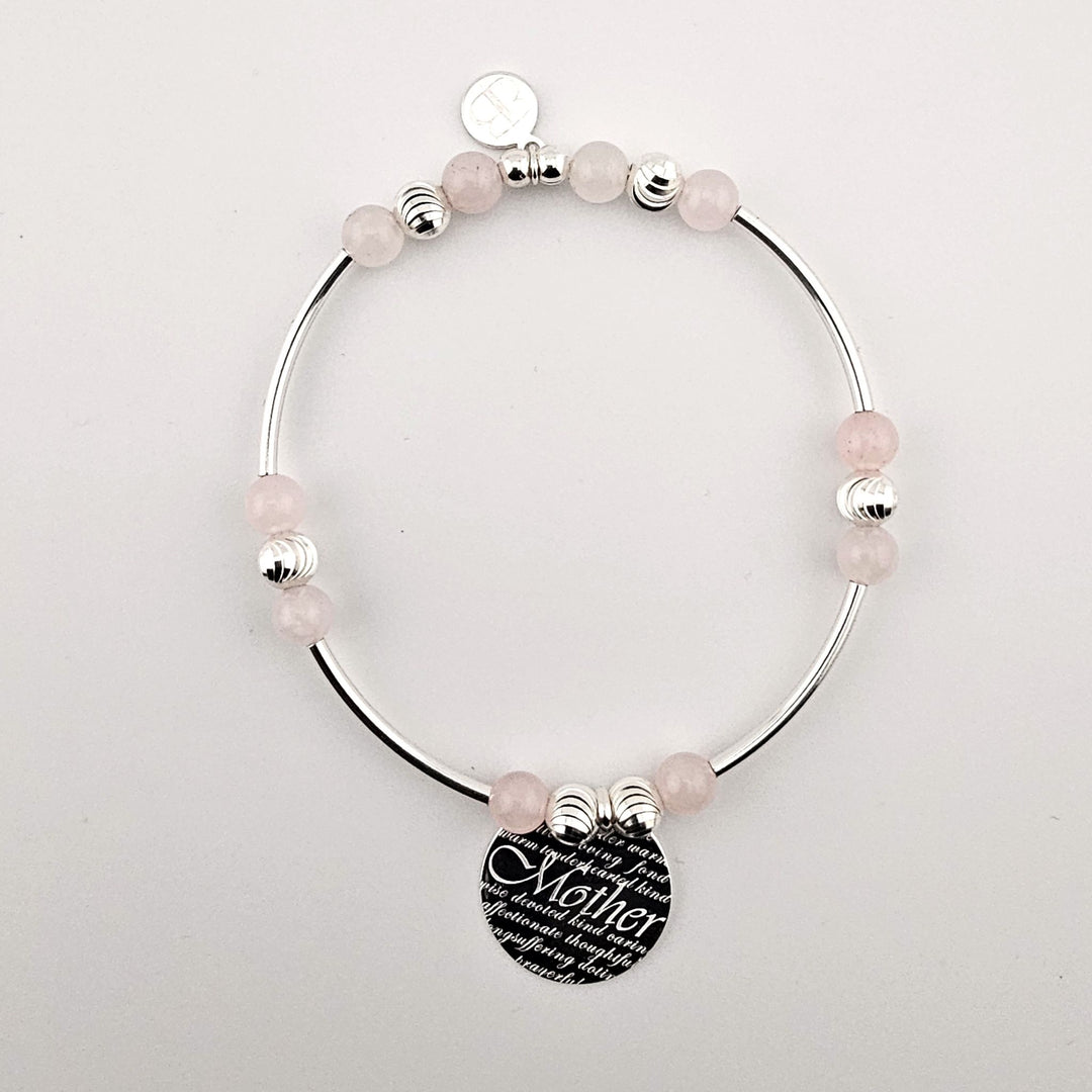 Sterling silver and rose quartz Mother bracelet with engraved charm.